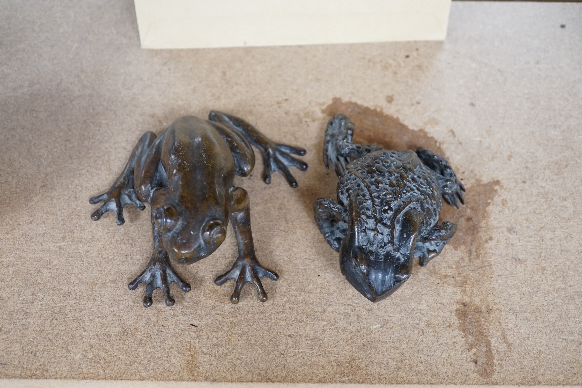 Pierre Chenet foundry (modern), a bronze model of a frog, together with an unsigned bronze model of a toad, largest 12cm. Condition - fair